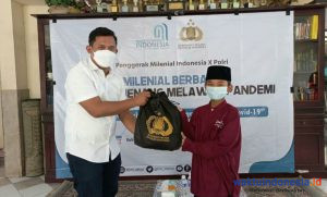Penggerak Milenial Indonesia Dan Polri Bagikan Ratusan Paket Sembako