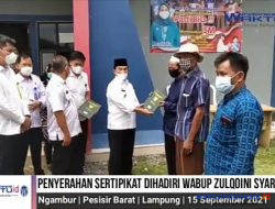 VIDEO: Wabup Zulqoini Hadiri Penyerahan Sertipikat PTSL di Negeriratu Ngambur